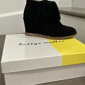 Adorable suede wedge ankle boots.